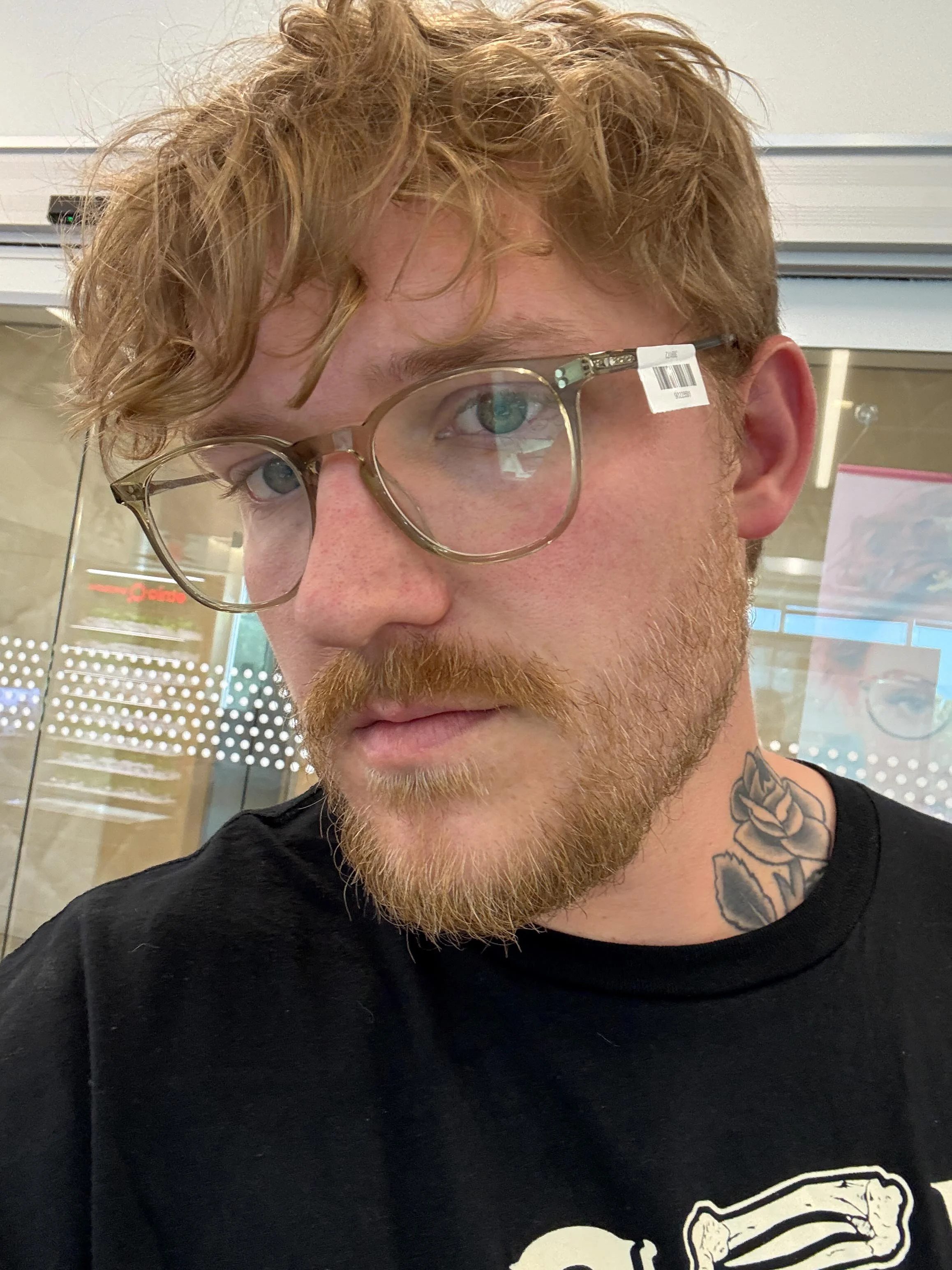 Trying on glasses selfie